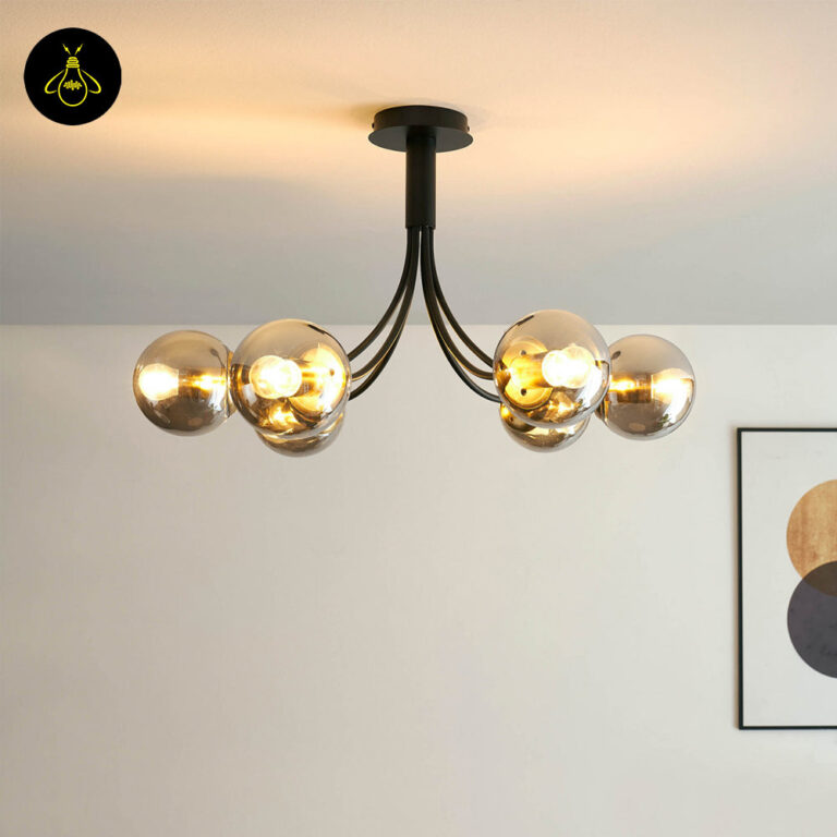 Smoke glass globe chandelier in matte black mounted on a bedroom ceiling