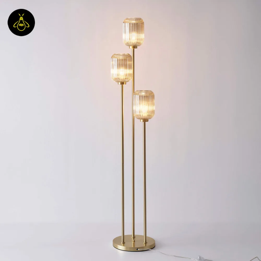 Triple Amber Glass Floor Lamp – 3-Light Gold Ribbed Glass Statement 9 Detail of the E27 holder inside an amber glass shade on the floor lamp