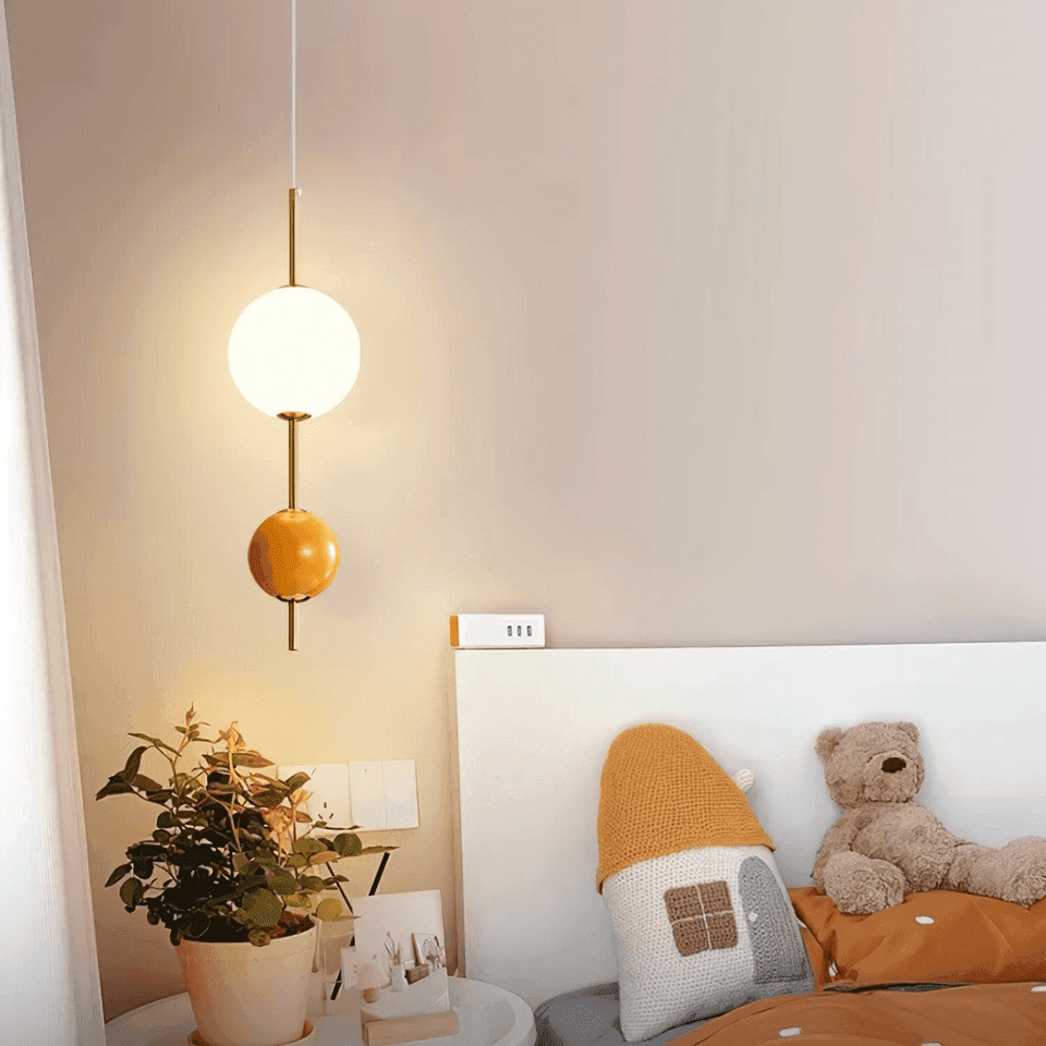 Glass Ball Pendant Light – Gold & Orange Two-Globe Drop, 50 cm | JagMag Lights 5 Glass ball pendant light as a bedside drop over a nightstand in a modern bedroom
