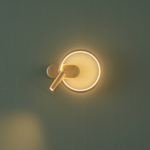Gold circle wall light with LED ring and adjustable reading spot