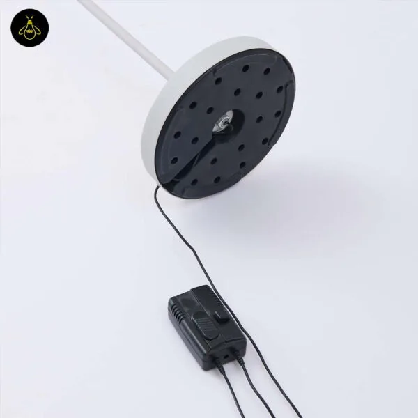 White LED floor lamp with adjustable head in a hotel suite style room