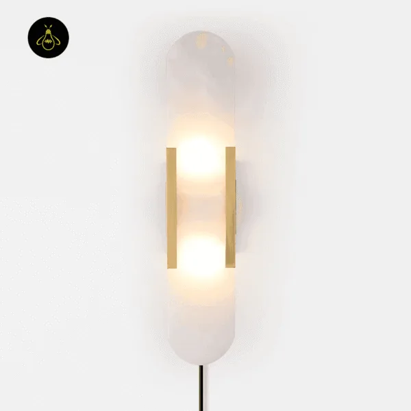 Linear alabaster wall light lit from inside, two warm glows through the alabaster, gold frame, front view