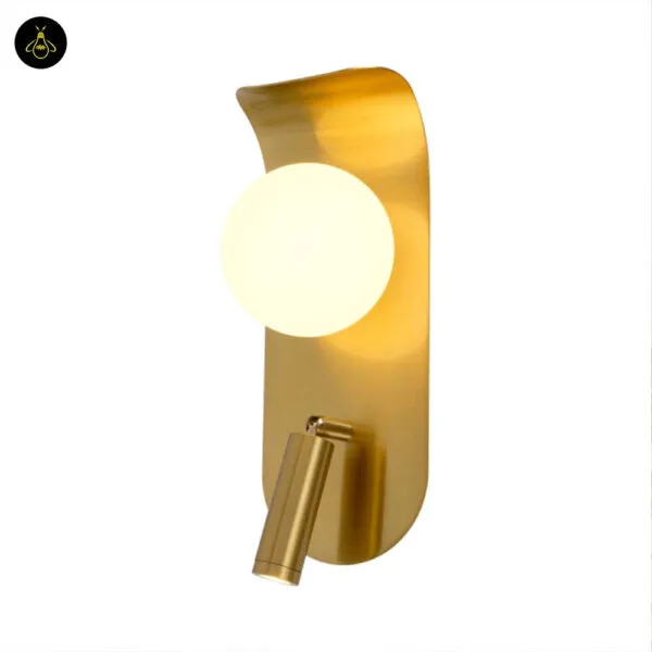 Bedroom reading light on a white background, opal borosilicate glass globe glowing above a brushed gold leaf and reading spot