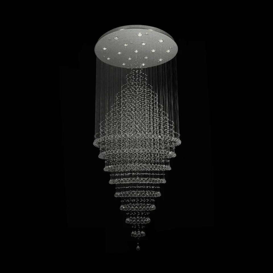Long chandelier in clear K9 crystal balls falling from a round steel plate, unlit, on a black background