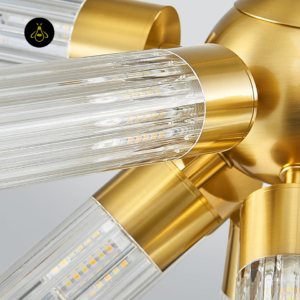 Luxury gold fluted glass chandelier as a centrepiece above a dining table