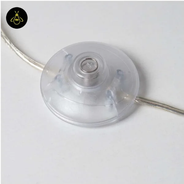 Inline on/off cord switch on the gold floor lamp with amber borosilicate glass spheres