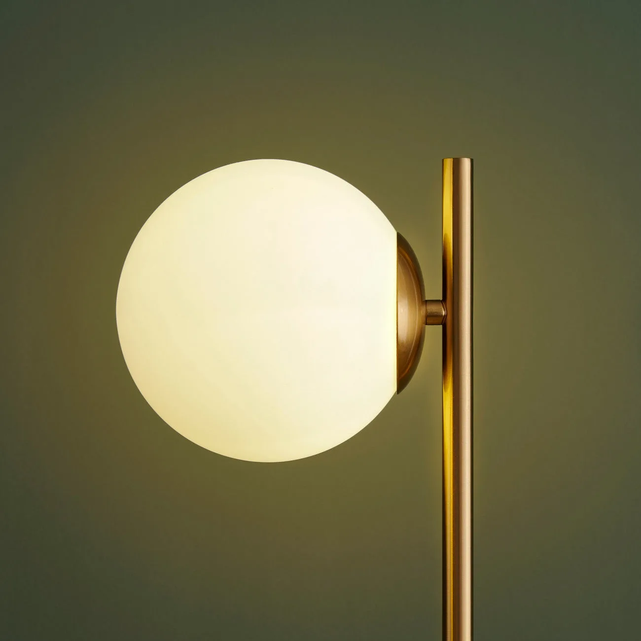 Marble Table Lamp with Opal Glass Globe – Brass Finish, 34 cm 2 Marble table lamp with opal borosilicate glass globe lighting an office desk