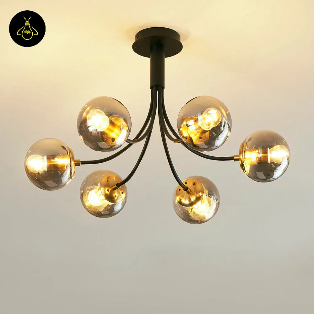 Black glass chandelier with six smoke-grey glass globes on a matte-black sputnik frame for living rooms