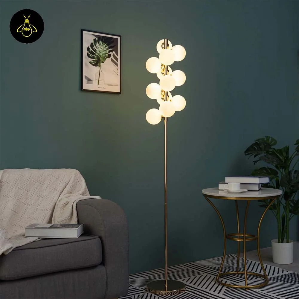 White Globe Floor Lamp – 12 Gold-Framed Opal Spheres | Ambrosia 6 White globe floor lamp styled in a living room casting a warm ambient glow
