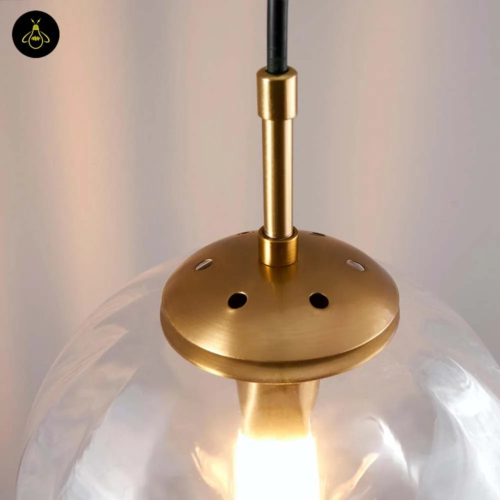Ribbed Glass Ball Pendant Light – Smoked Finish 6 Modern smoked glass pendant light for indoor use – living room setting