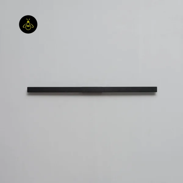 Slim LED wall light switched off, mounted horizontally as a thin matte black line on a light grey wall