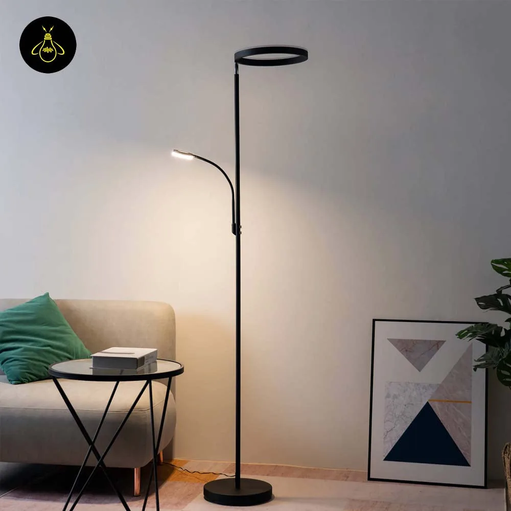 Black LED Floor Lamp with Reading Light – 2-in-1 Ring Uplight 3 Modern black LED floor lamp with ring uplight and reading arm beside a sofa