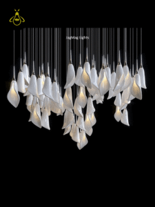 Modern jhumar for hall — white glass leaf cascade chandelier with a warm internal glow
