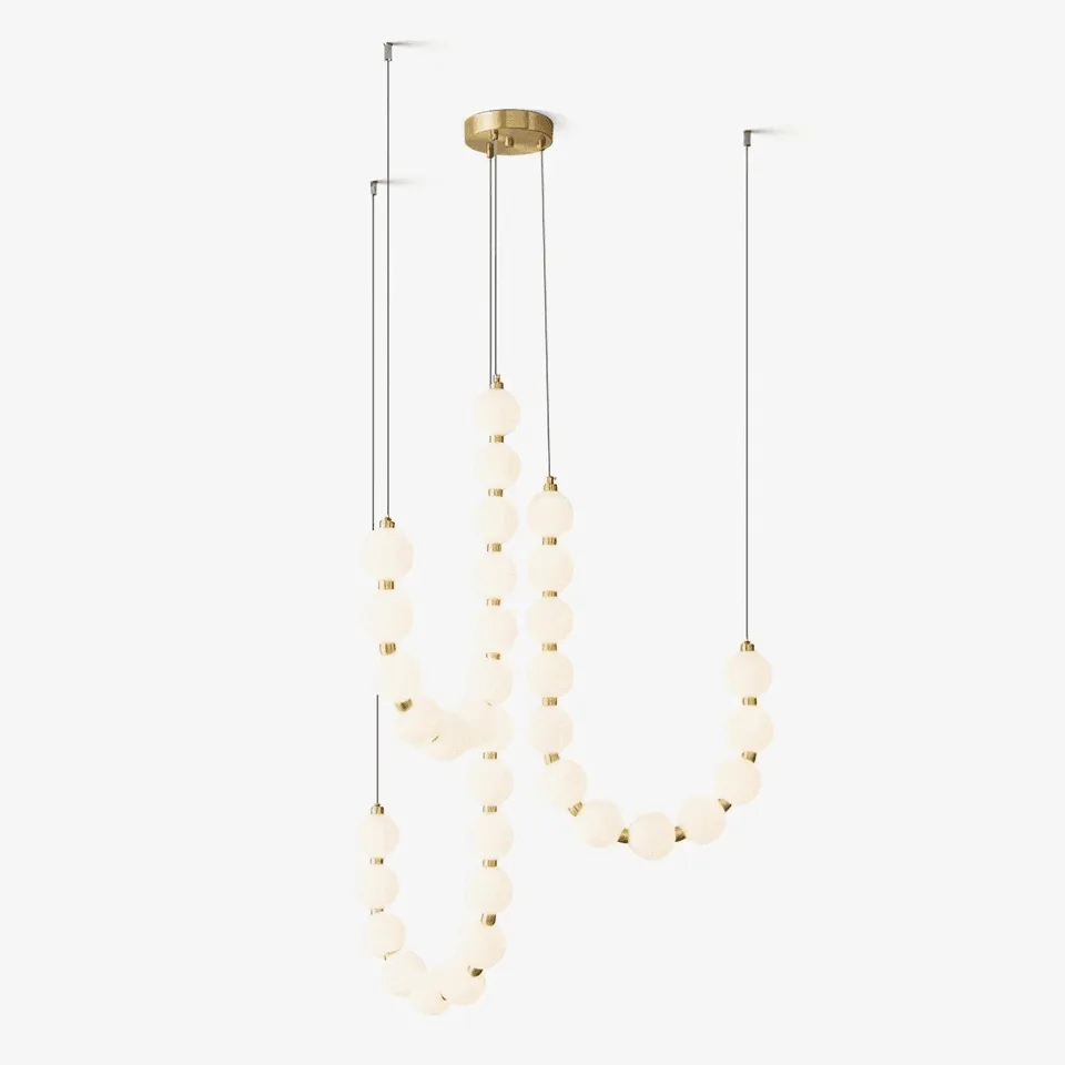 Pearl necklace chandelier with opal borosilicate glass orbs lit warm, hung from a round gold canopy