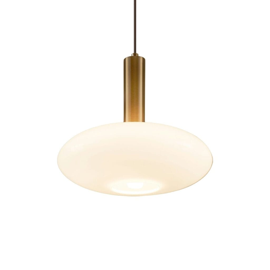 Brass-finish frame detail of a round opaline glass pendant light