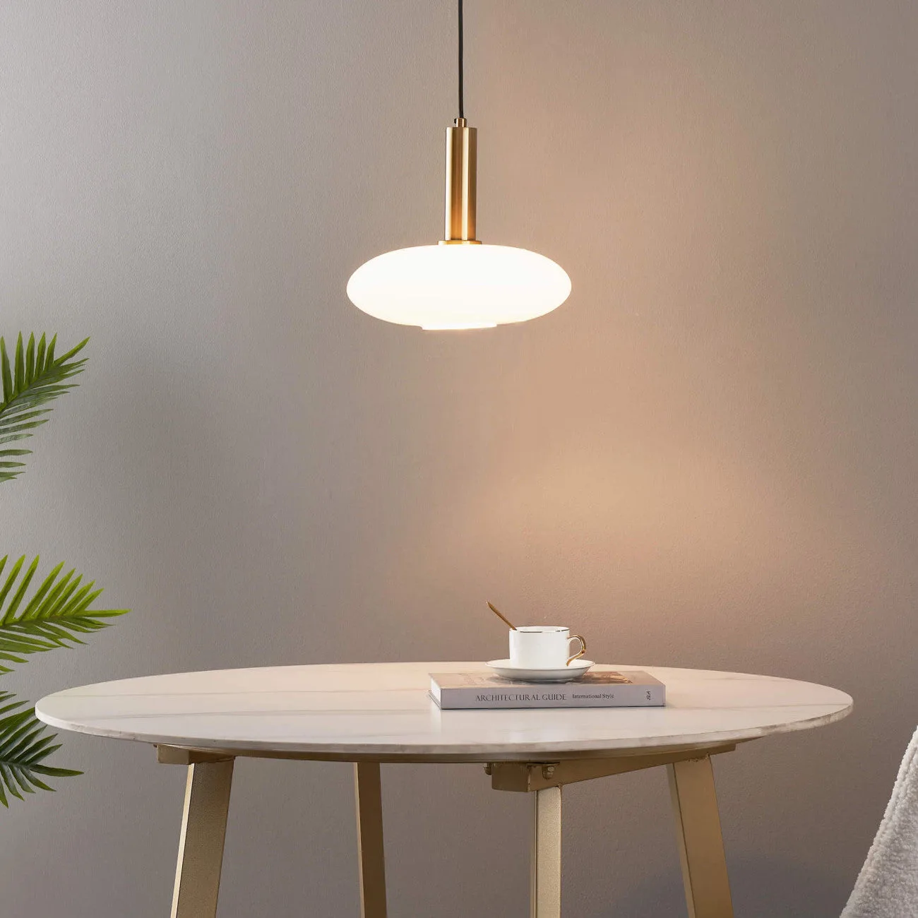Opaline Glass Pendant Light – Round Brass-Finish Design 4 Front view of a round opaline glass pendant light with brass finish