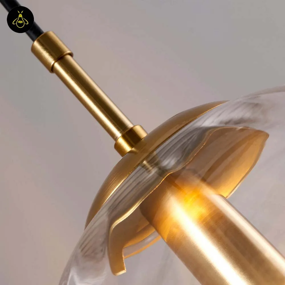 Ribbed Glass Ball Pendant Light – Smoked Finish 5 Ribbed glass ball pendant light over dining table – warm ambient glow