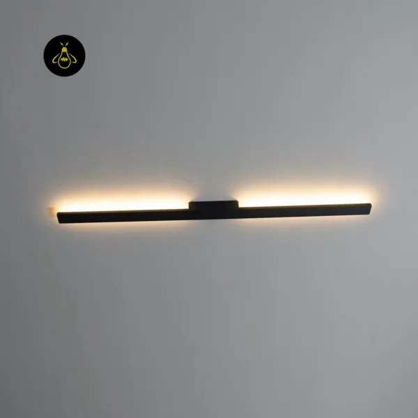 Slim LED wall light fixed horizontally on a grey wall, warm 3000K light washing the wall above the matte black bar