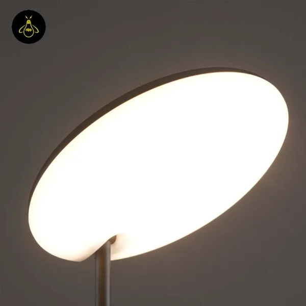 Black LED floor lamp with adjustable head in a modern living room corner