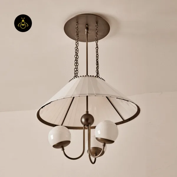 Angled view of the vintage glass chandelier showing its chains, pleated shade and antique brass arms