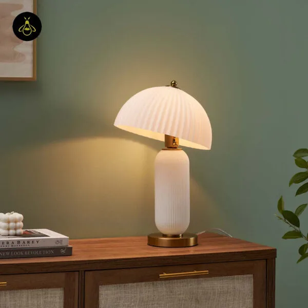 White fluted glass mushroom table lamp with brass base, side view