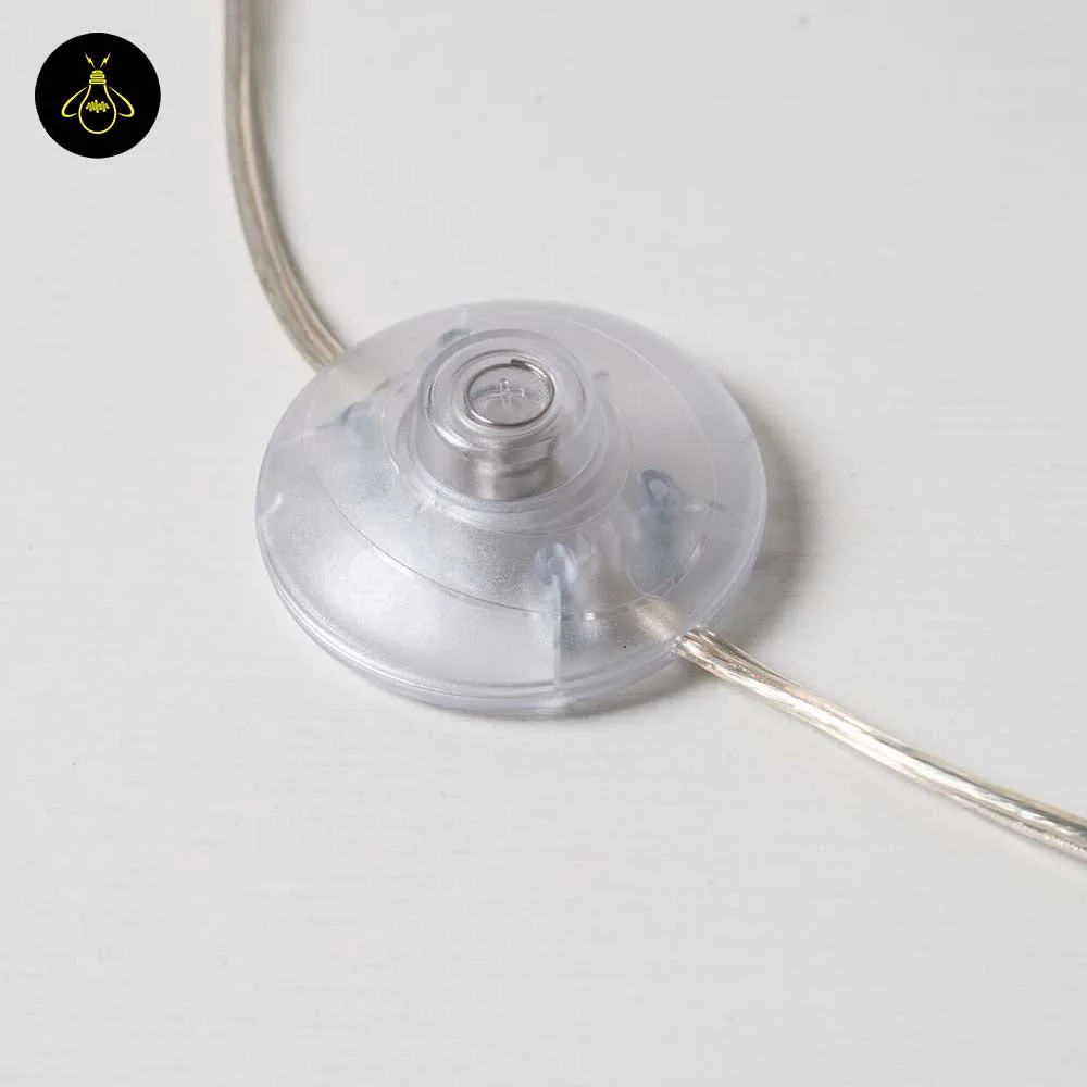 White Globe Floor Lamp – 12 Gold-Framed Opal Spheres | Ambrosia 12 Clear cable grommet and wiring detail at the base of the white globe floor lamp