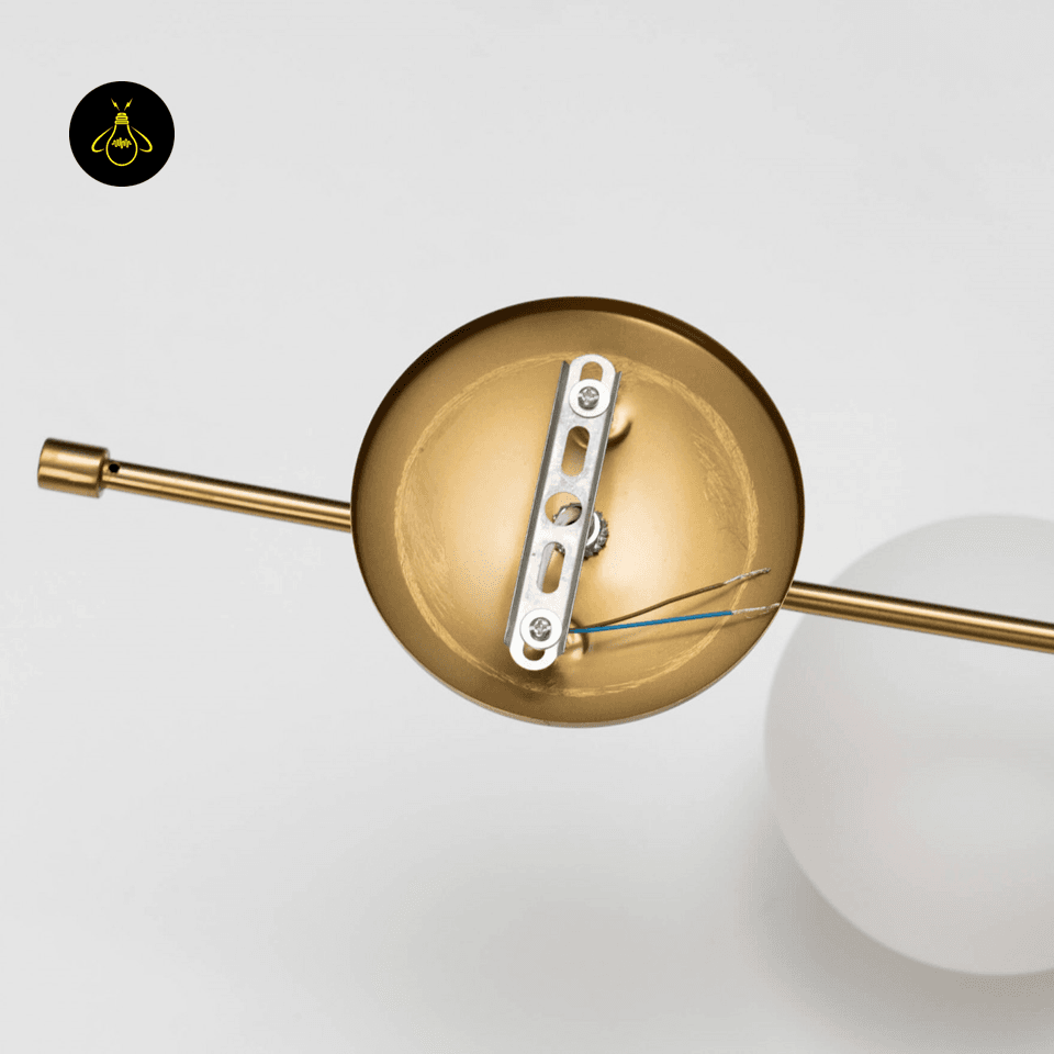 Gold Wall Light for Living Room – Oriol 48 cm Globe Sconce 12 White frosted glass globe of the gold wall light for soft ambient wall lighting