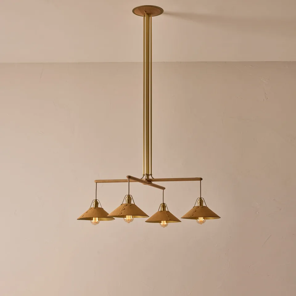 Wood and brass chandelier with an oak bar and four leather-clad shades