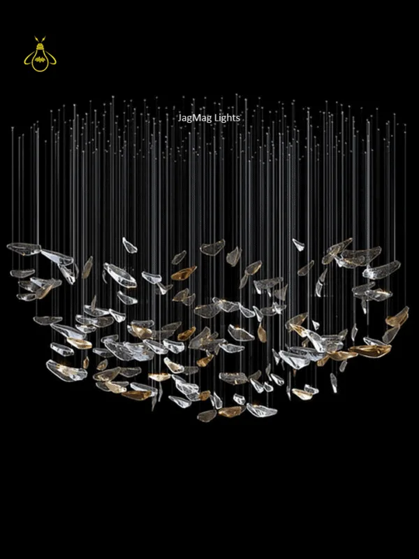 Glass jhumar chandelier close-up of clear and gold art-glass leaf elements on slim rods