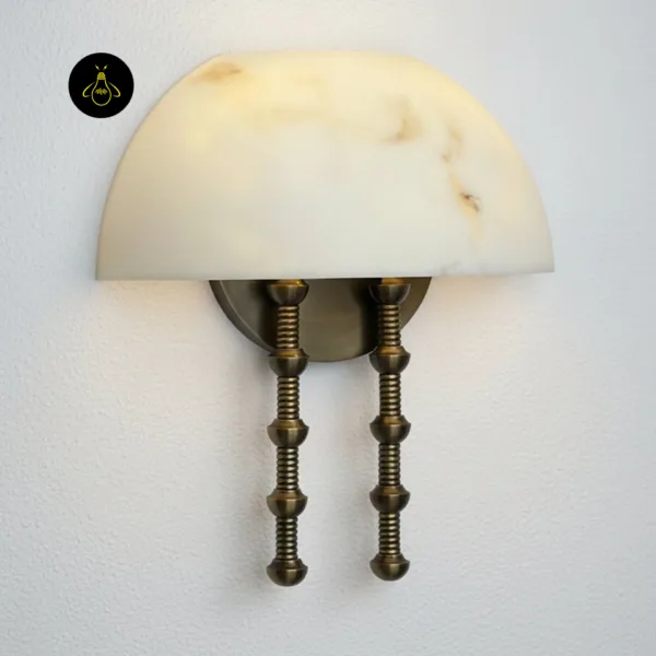Close view of the alabaster dome wall light showing honey veins in the stone and antique brass-finish rods