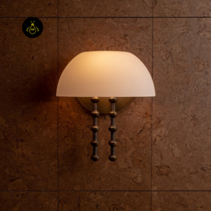 Modern wall sconce close-up showing the twin turned metal hanging rods