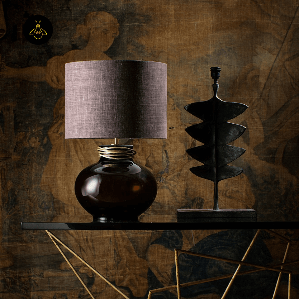 Amber Glass Lamp – Boudica Modern Bedside Table Lamp, 62 cm 5 Amber glass lamp styled on a console table in a warm, art-filled interior