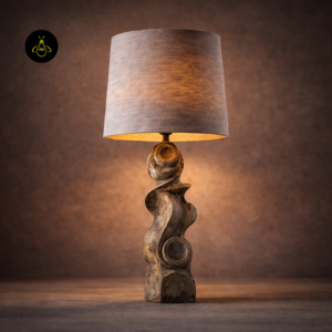 Dorian table lamp front view showing sculptural wood base details