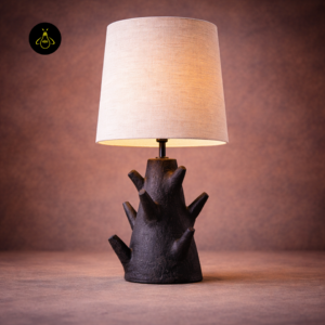 Rustic table lamp front view with tree inspired wood base and fabric shade