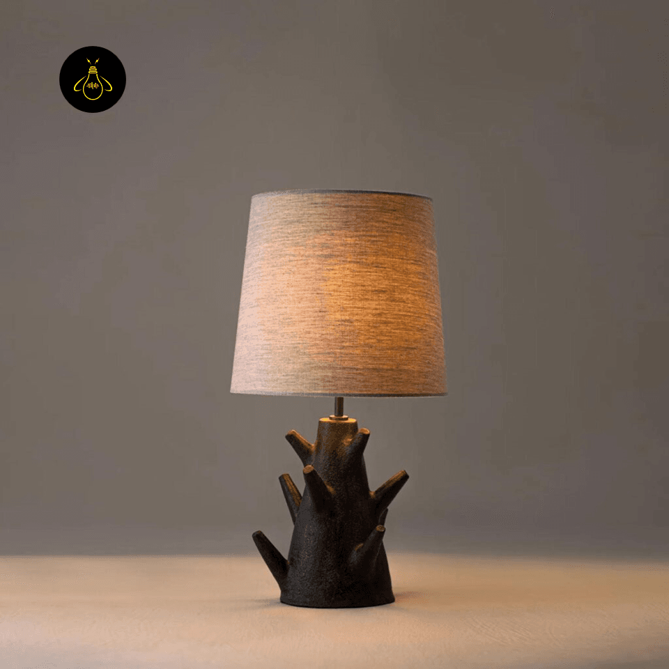 Rustic Table Lamp – Sculptural 59 cm Branch Base | FIR 2 Rustic table lamp lit with a warm diffused glow through its fabric shade in a bedroom