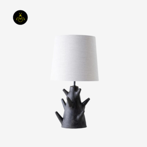 Rustic table lamp full view with dark carved wood base and neutral fabric shade