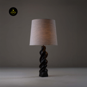 Lucian wooden table lamp lit with warm ambient glow