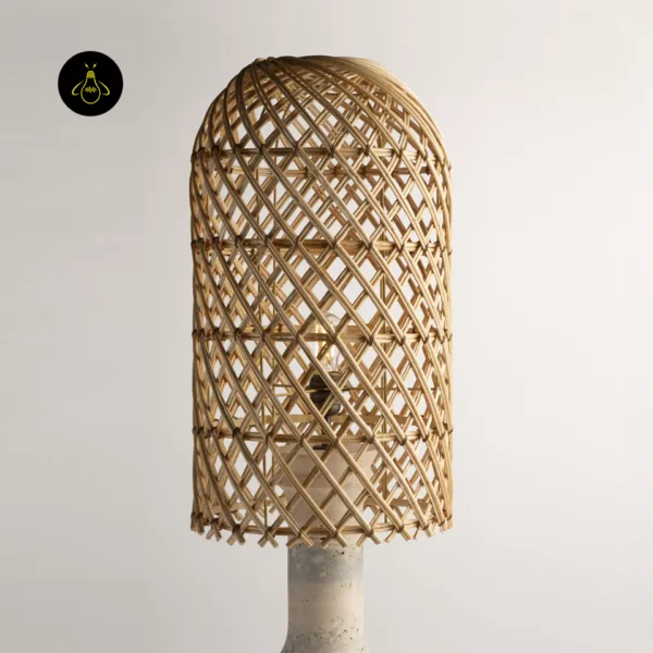 Domed woven rattan shade detail of the Milos table lamp