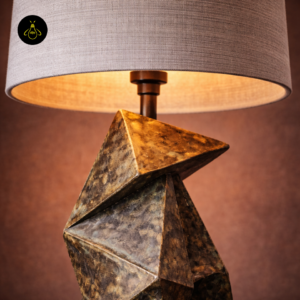 Detail view of origami wooden table lamp showing shade and folded base
