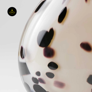 Close-up of small table lamp handblown spotted glass pattern