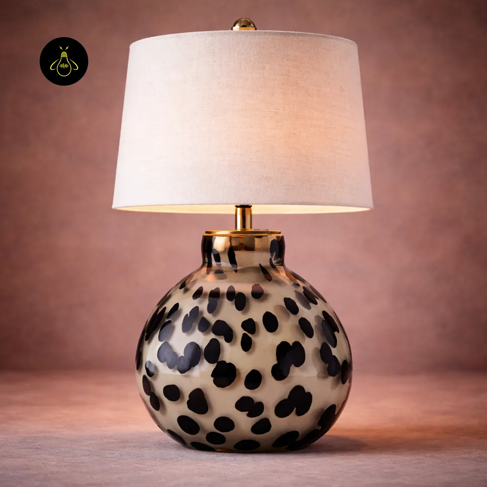 Glass Table Lamp – Handblown Spotted Ottie 50 cm Bedside Accent 7 Glass table lamp lit to show a warm ambient glow through the grey linen shade