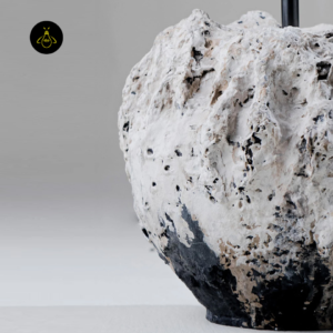 Designer table lamp detail with layered wood texture