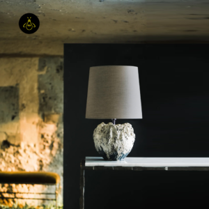 Designer table lamp styled on a console in a warm interior