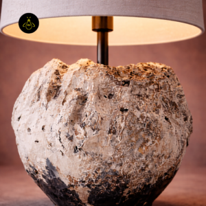 Close-up of designer table lamp shade and textured wood base