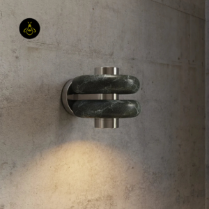 Modern wall light illuminated to show the glow through the green alabaster bands