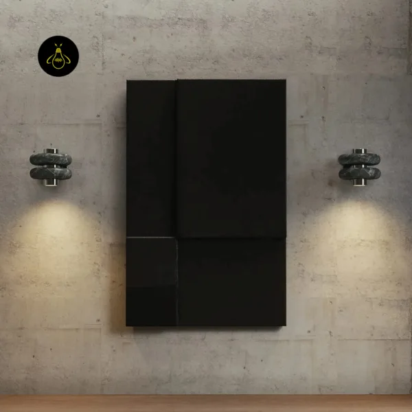 Pair of green marble wall lights either side of black wall art, each casting a warm downward beam