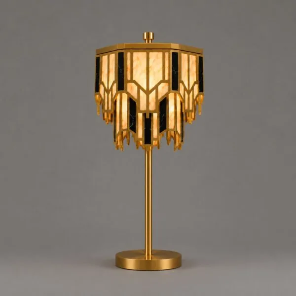 Art Deco brass table lamp with tiered alabaster and black marble shade, lit