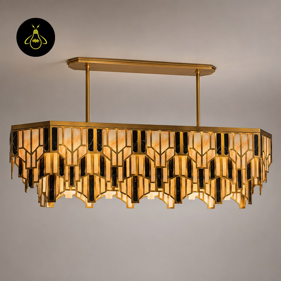 Linear dining chandelier with brass frame and alabaster-effect panels glowing over a table