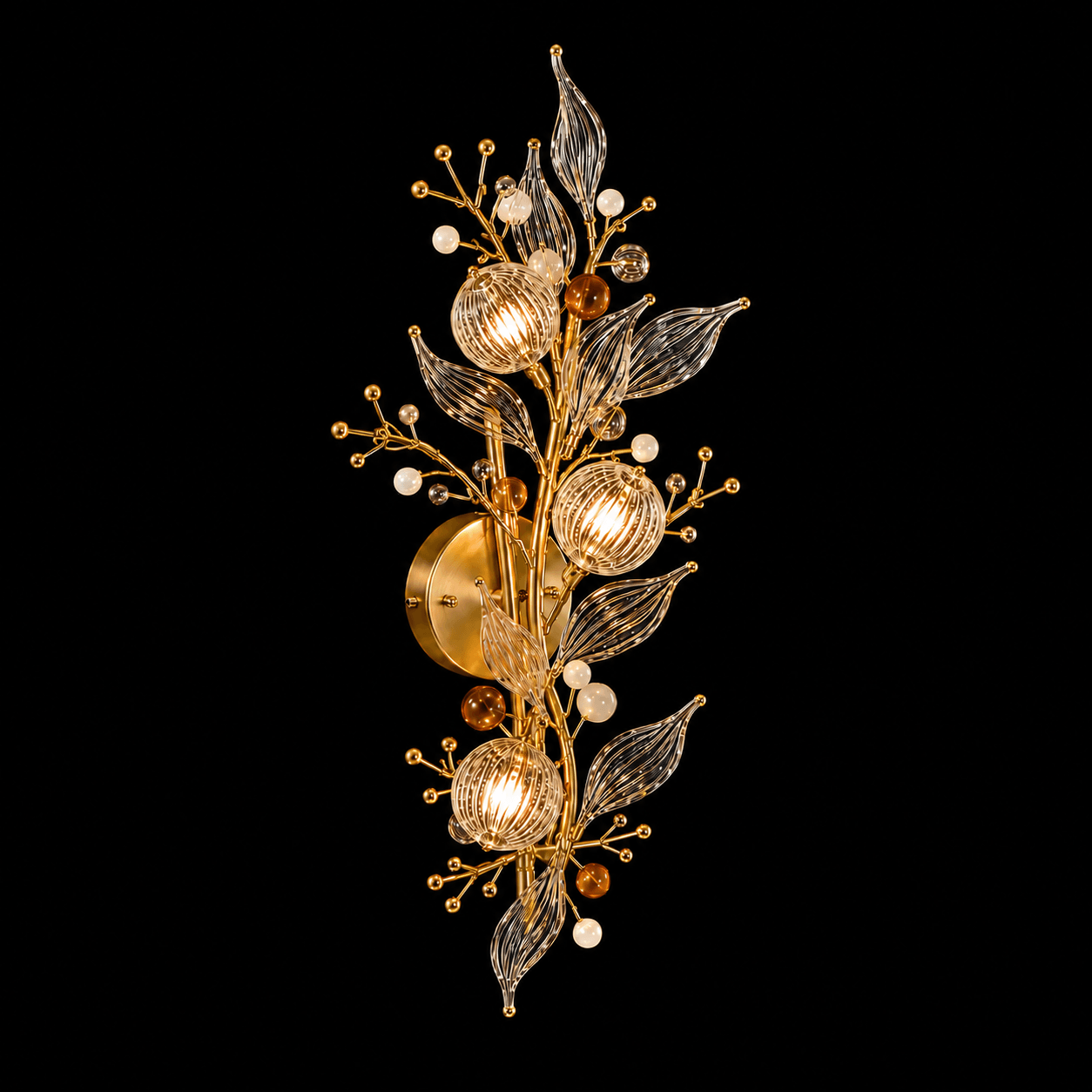 Crystal Botanical Wall Sconce — 3-Light Glass Globe & Leaf Bouquet 2 Crystal botanical wall sconce on black background lit — gold metal branches with three ribbed glass globe shades, clear glass leaves, amber cognac orbs and white opal bead sprays