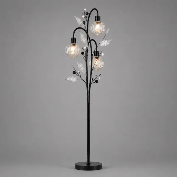 Crystal berry botanical floor lamp on grey background lit — black metal tree trunk with three ribbed clear borosilicate glass globe cage shades, clear ribbed glass leaves and matte black and white pearl bead accents